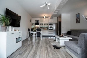 Apartment (Granit) | Living area | Flat-screen TV
