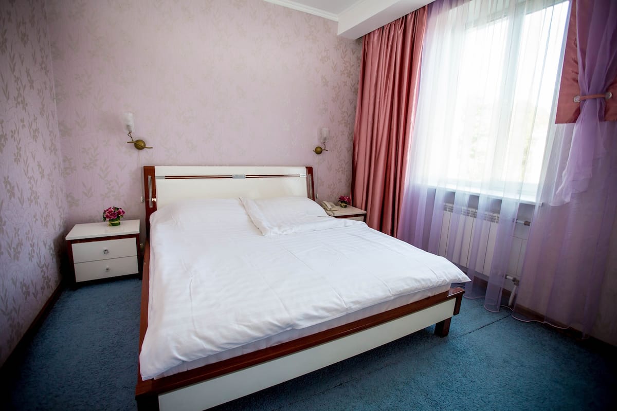 Suite, 1 Bedroom | 1 bedroom, desk, iron/ironing board, free WiFi