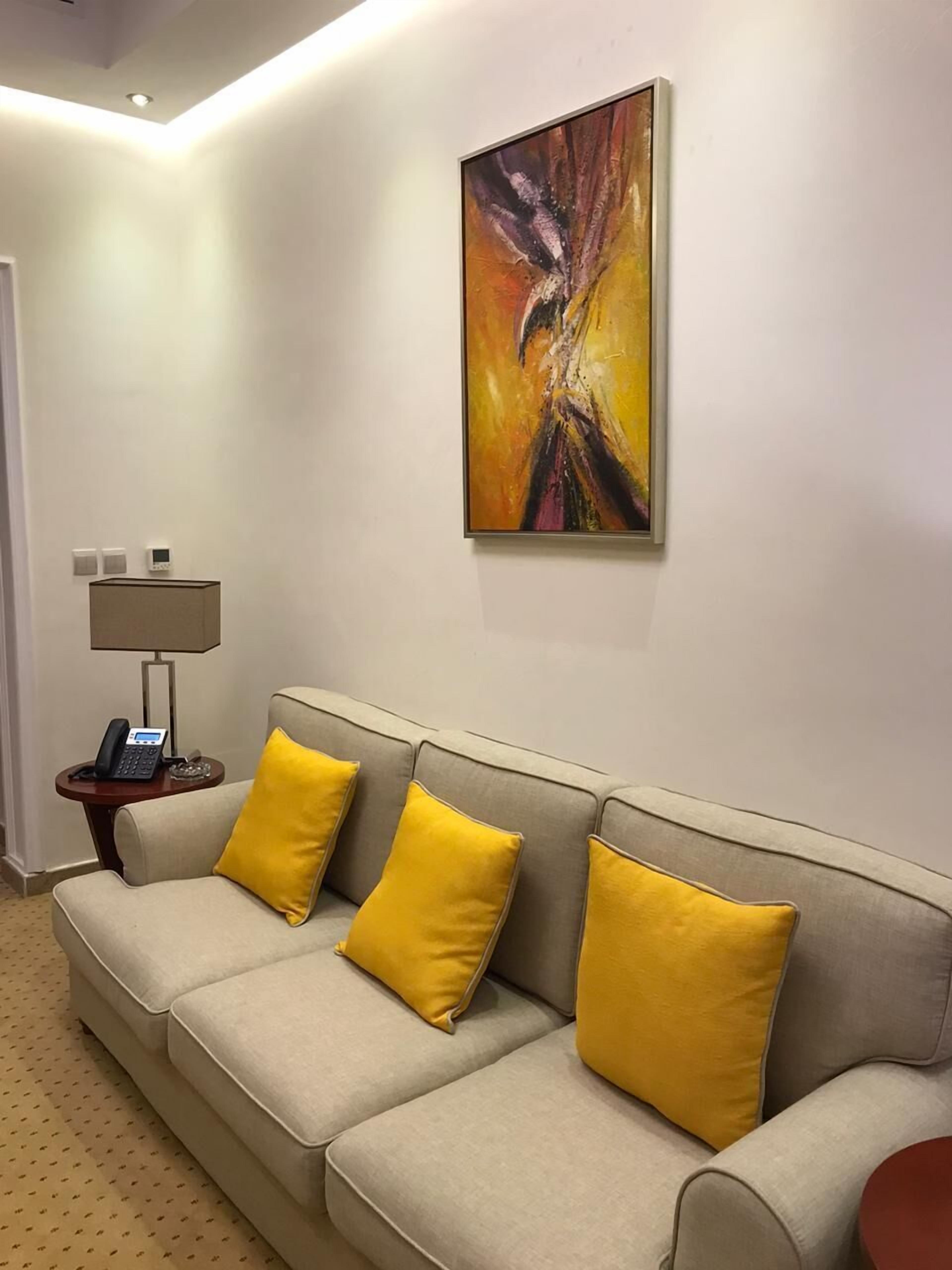 standard room, 1 king bed | living area | lcd tv