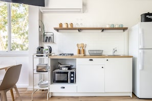 Apartment, 2 Bedrooms | Private kitchen | Fridge, microwave, oven, stovetop