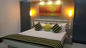 Habitación Deluxe, vista al jardín | Sábanas de algodón egipcio y ropa de cama de alta calidad