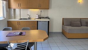 Apartment (4 Adults) | Private kitchen | Fridge, stovetop, electric kettle, toaster - Acropolis Apartments (Hersonissos)
