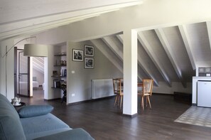 Suite, Private Bathroom | Living area