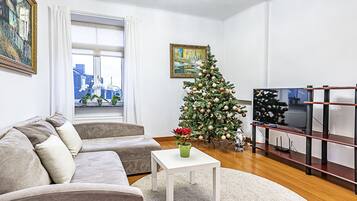 Comfort Apartment | Ruang tamu | TV skrin rata