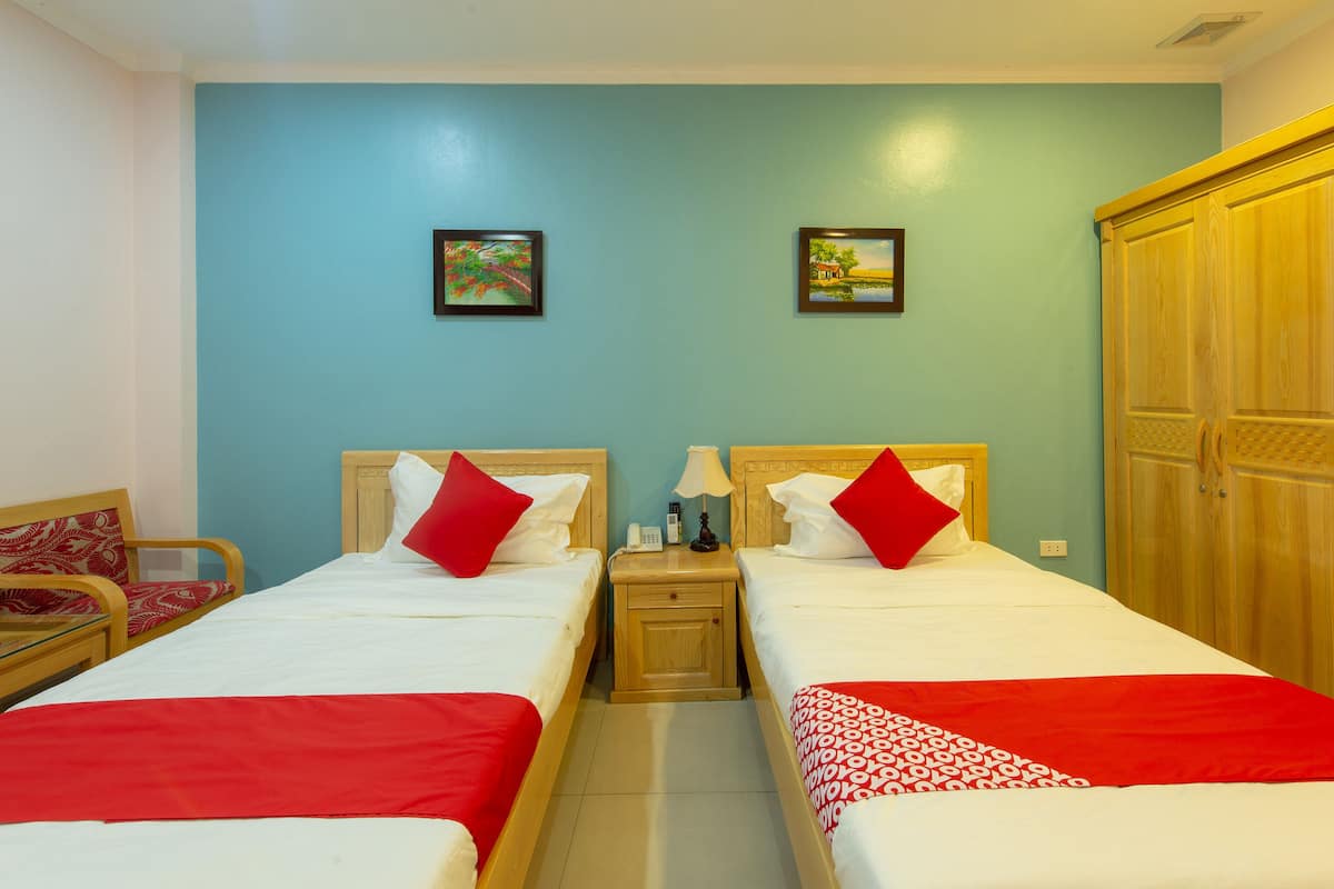 Quarto duplo standard | Frigobar, escrivaninha, Wi-Fi de cortesia, roupa de cama