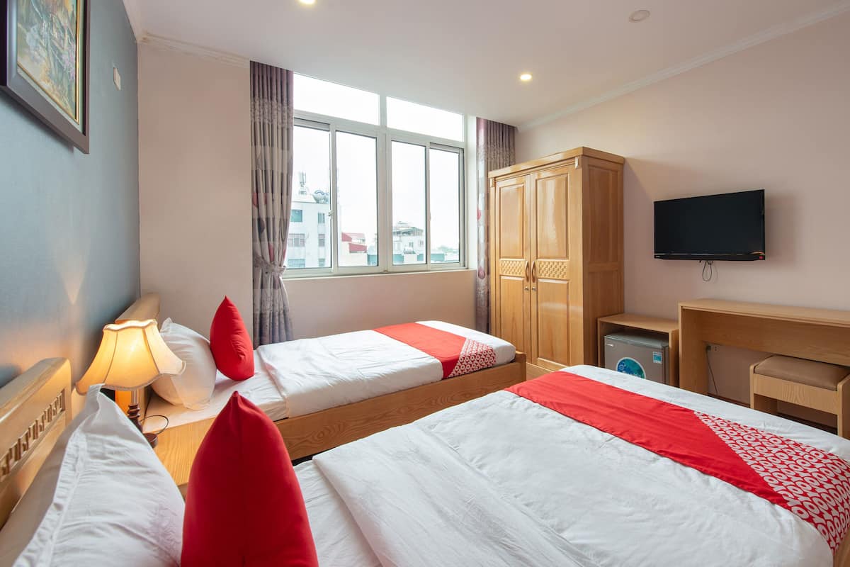 Chambre supérieure avec lits jumeaux | Minibar, bureau, accès au Wi-Fi (inclus), literie fournie