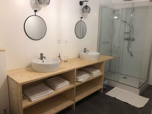 Shower, hair dryer, towels, soap