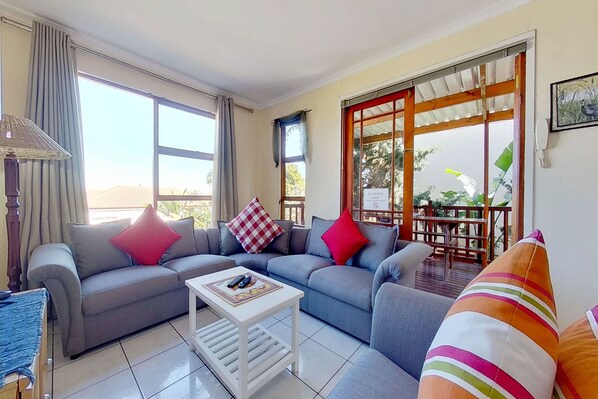 Comfort Apartment, 2 Bedrooms | Living room | Flat-screen TV