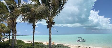 On the beach, sun-loungers, beach towels