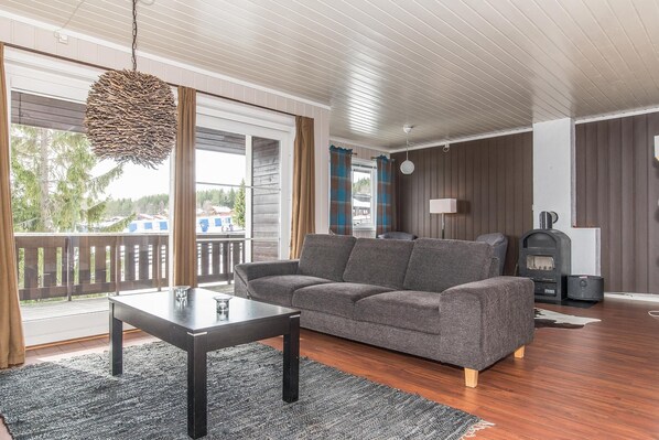 Departamento (Hotel) | Sala de estar | Televisión de 32 pulgadas con canales por cable 