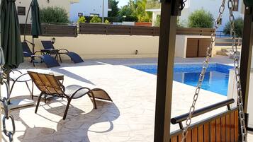 Outdoor pool, pool umbrellas, sun loungers