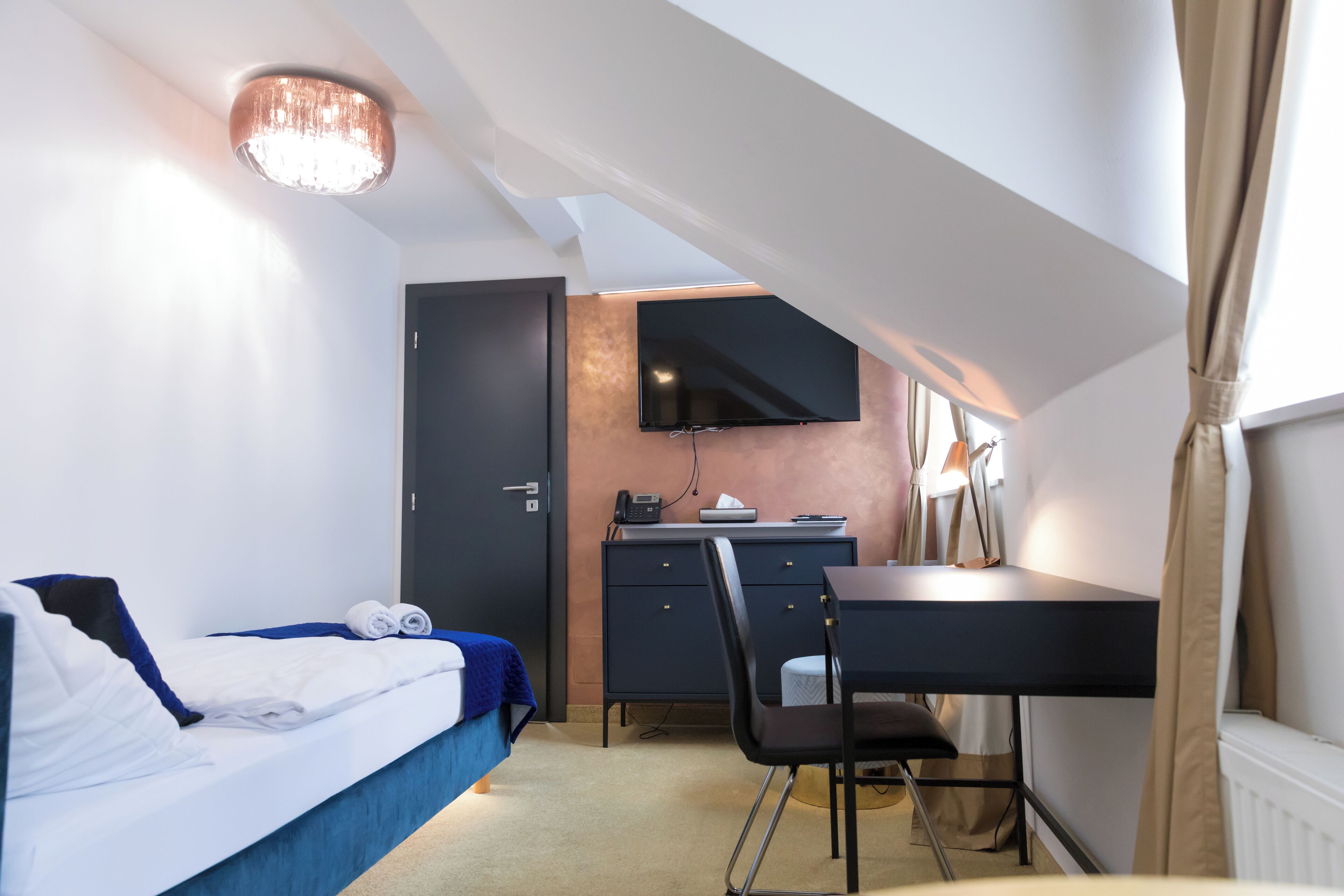 Studiosuite – business, 1 enkeltseng | Bad | Dusj, toalettartikler (inkludert), hårføner og håndklær