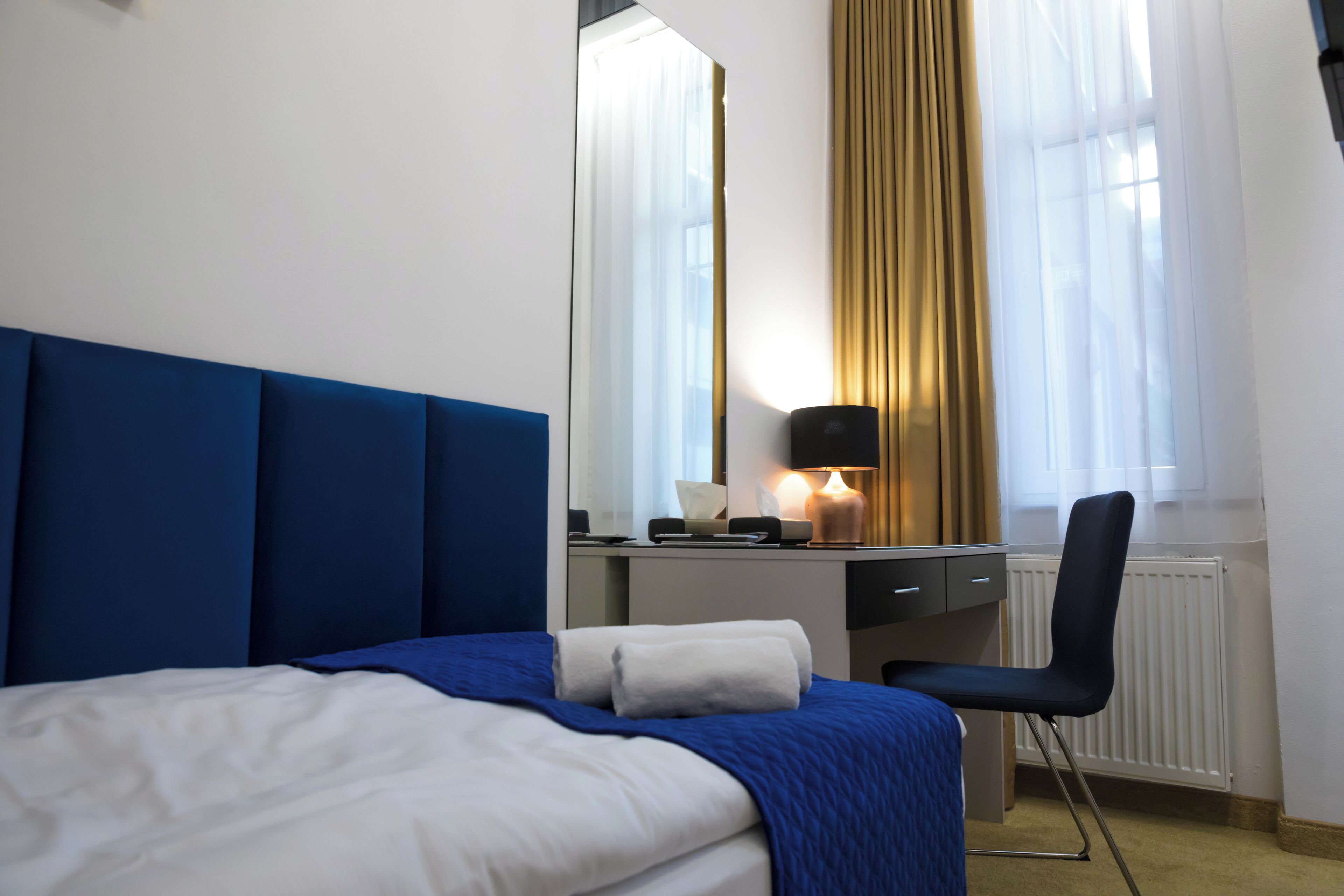 Økonomi-enkeltrom | Safe på rommet, individuelt dekorert, individuelt innredet og skrivebord