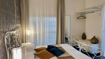 Camera Basic con letto matrimoniale o 2 letti singoli, al piano terra (3) | 1 camera, culle/letti per bambini (a pagamento), Wi-Fi gratuito