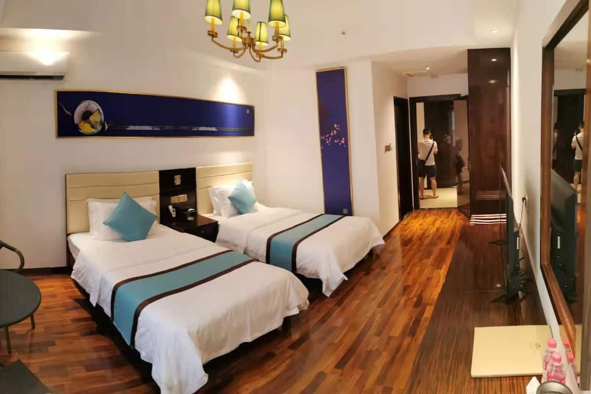 Deluxe Twin kamer | Een kluis op de kamer, een bureau, gratis wifi, beddengoed