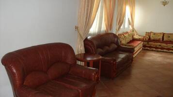 Superior Apartment, 2 Bedrooms | Living room | 32-inch plasma TV with satellite channels, TV