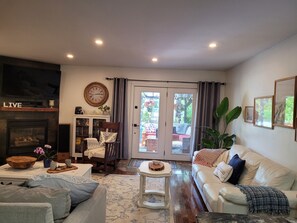 Smart TV, fireplace, DVD player, books