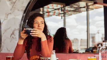 Daily buffet breakfast (GBP 15 per person)