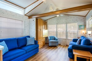 Cottage, 1 Bedroom (Linens Not Included) | Living room | 10-inch TV with cable channels - Bethpage Camp-Resort (Urbanna)