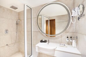 One Bedroom Apartment | Bathroom | Shower, rainfall showerhead, hair dryer, slippers - Keys Select by Lemon Tree Hotels, Gandhi Ashram, Ahmedabad (Ahmedabad)