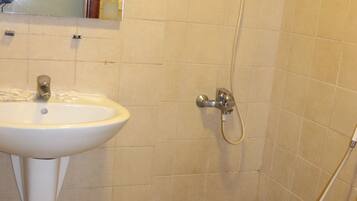 Shower, free toiletries, slippers, bidet