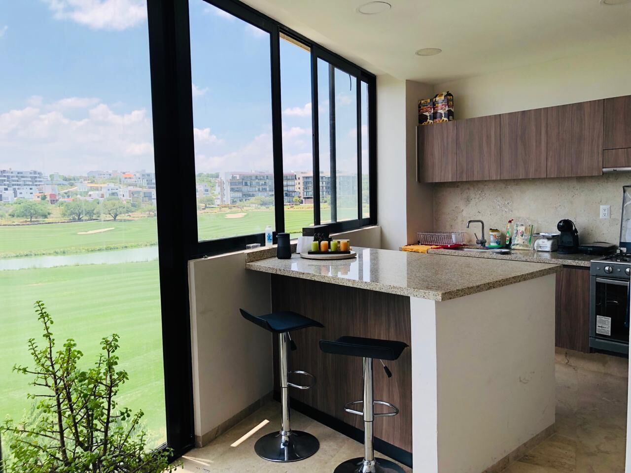 BEATIFUL DEPARTMENT WITH AN AMAZING VIEW TO A NATURAL RESERVE AND GOLF