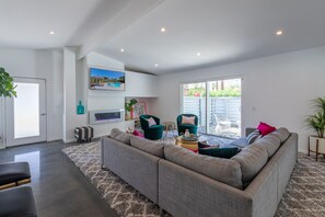 Smart TV, fireplace, books