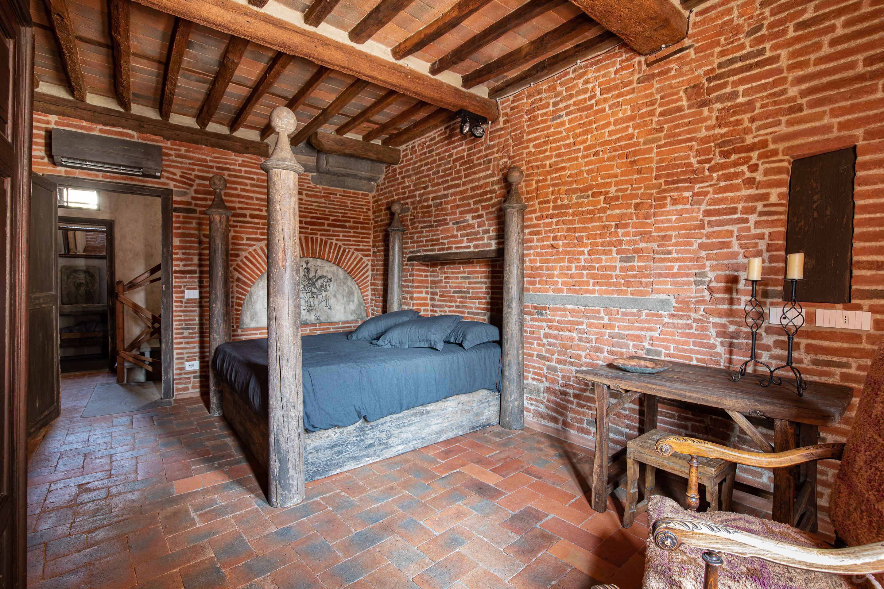 Medieval Tower House alongside the Cathedral San Martino Bell Tower built 1204.