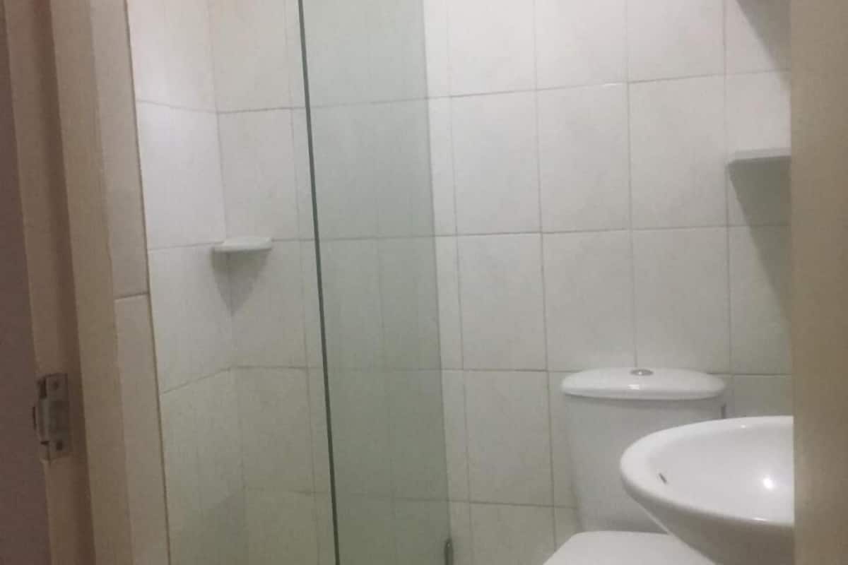 shower, towels, soap, toilet paper