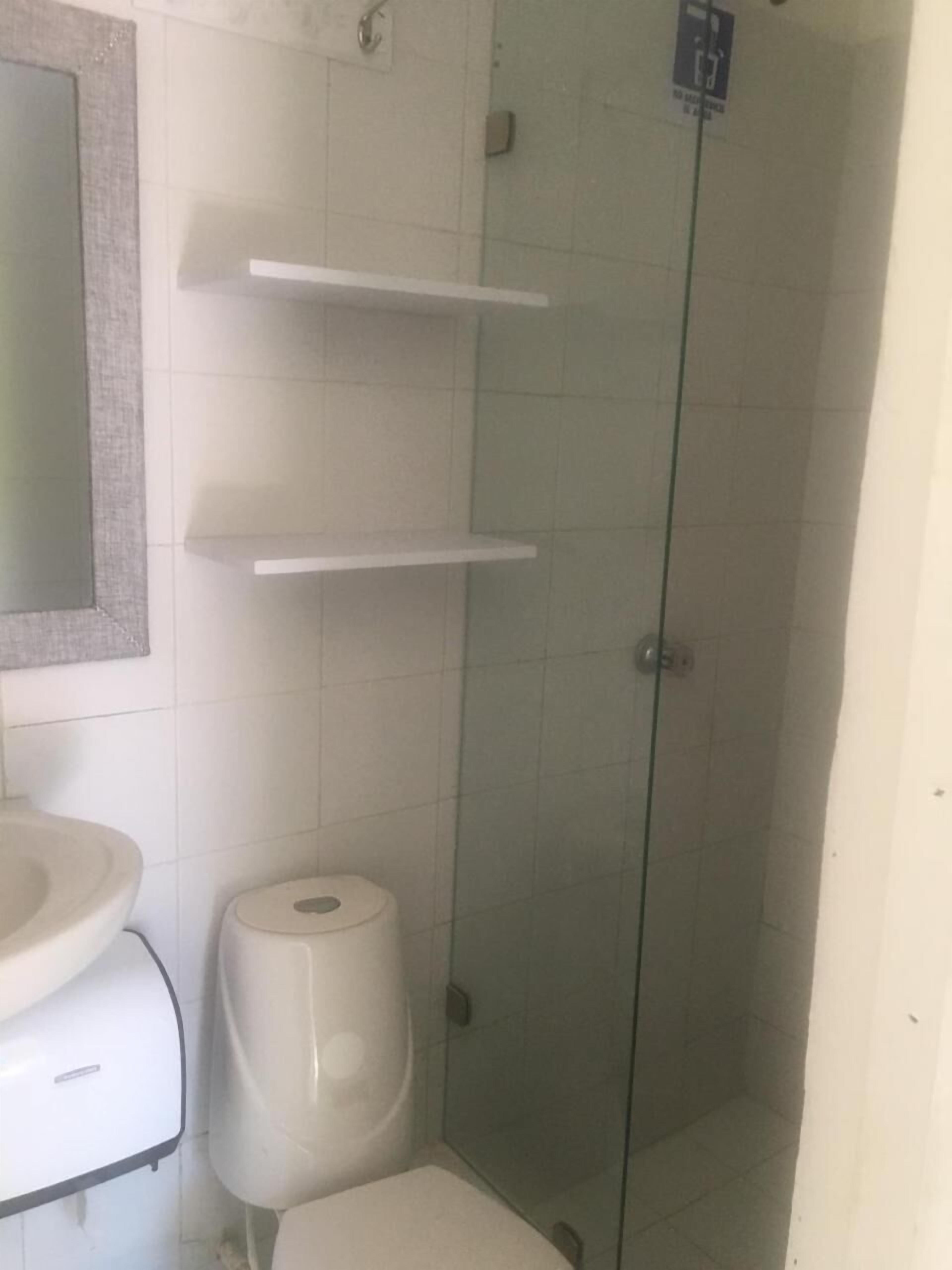 shower, towels, soap, toilet paper