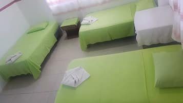Economy Triple Room | Minibar, free WiFi, bed sheets