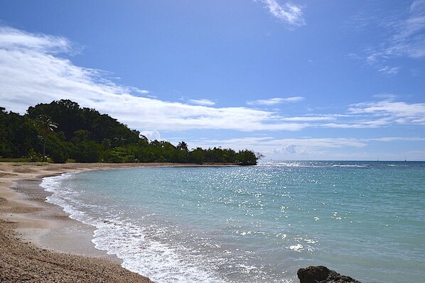 On the beach, sun loungers
