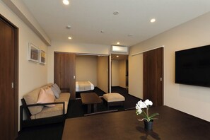 Executive-Suite, 2 Schlafzimmer, Nichtraucher, Whirlpool | Wohnbereich