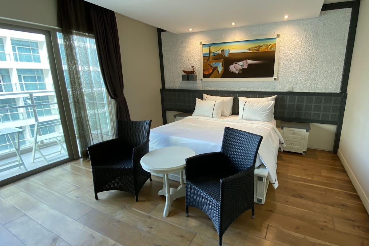 Luxury Apartment, 1 Bedroom, Kitchenette, Beach View | 1 bedroom, Egyptian cotton sheets, premium bedding, down comforters