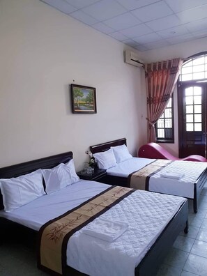 Twin Room | Desk, blackout drapes, iron/ironing board, free WiFi
