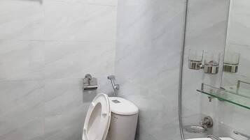 Shower, free toiletries, hair dryer, slippers