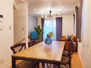 Three-Bedroom Apartment | Living area | 65-inch flat-screen TV with digital channels, TV - Etranger Kaname Cho (Tokyo)