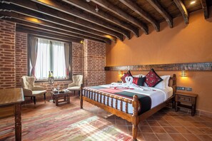 Luxe beddengoed, een minibar, een kluis op de kamer, een bureau