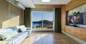Family House (Noeul, Caters to Family Only) | Living area | LCD TV - Namhae Oceanview Pension (Namhae)