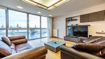 Exclusive Apartment, 1 Queen Bed with Sofa bed | Living room | TV