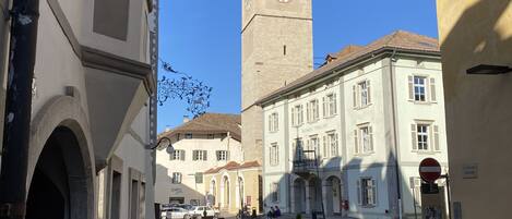 Stroll through the historic town square, surrounded by traditional European architecture and classic facades.