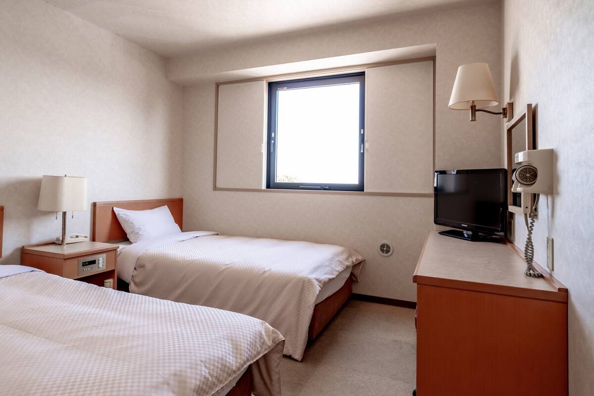 Desk, laptop workspace, iron/ironing board (on request), free WiFi