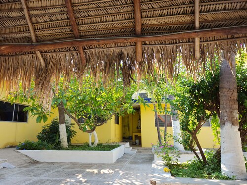 MELAQUE'S BEACH HOUSE