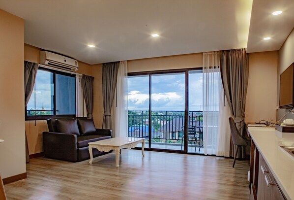 Family Room | Desk, blackout curtains, soundproofing, free WiFi - L2hotel (Khon Kaen)