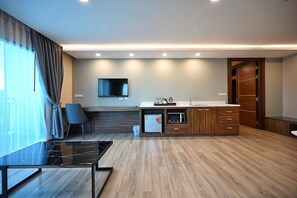 Family Room | Private kitchen | Mini-fridge, kitchen islands - L2hotel (Khon Kaen)
