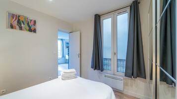 1 chambre, fer et planche Ă repasser, Wi-Fi gratuit, draps fournis