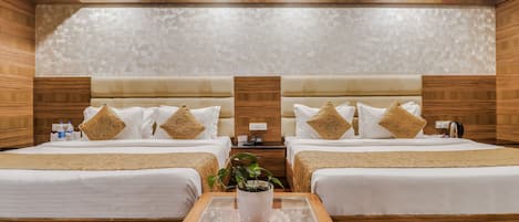 Family Quadruple Room | In-room safe, desk, laptop workspace, blackout drapes