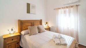 4 dormitoris, planxa i posts de planxar, un bressol de viatge i wifi 