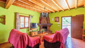 TV, fireplace - Poniente Almáchar by Ruralidays (Málaga)