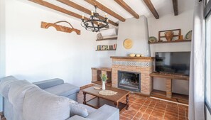 TV, fireplace, DVD player, stereo - Casa Adrian Almáchar by Ruralidays (Málaga)